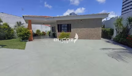 Casa de rua 3 suítes com excelente localização