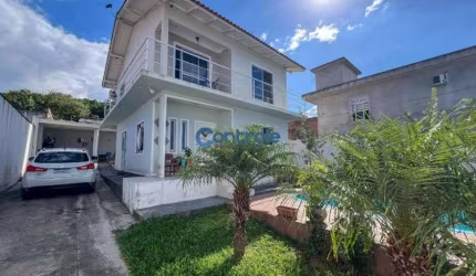 Excelente casa na região da Serraria com 03 dormitórios, 01 suíte e piscina.