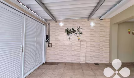 Sobrado com 3 dormitórios à venda, 155 m² por R$ 1.650.000,00 - Boqueirão - Santos/SP