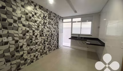 Sobrado com 3 dormitórios à venda, 119 m² por R$ 1.100.000,00 - Ponta da Praia - Santos/SP