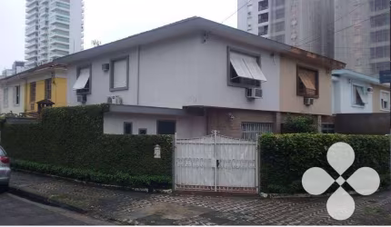 Sobrado com 3 dormitórios à venda, 122 m² por R$ 1.400.000,00 - Ponta da Praia - Santos/SP