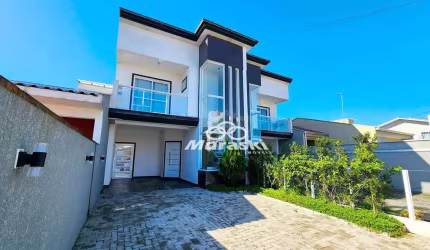 Sobrado com 3 dormitórios à venda, 136 m² por R$ 1.100.000,00 - Brejatuba - Guaratuba/PR