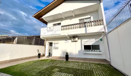 Casa com 4 dormitórios à venda, 294 m² por R$ 1.180.000,00 - Centro - Guaratuba/PR