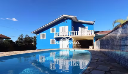 Casa com 4 dormitórios à venda, 200 m² por R$ 900.000,00 - Coroados - Guaratuba/PR