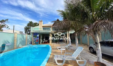 Casa com 4 dormitórios à venda, 230 m² por R$ 780.000,00 - Coroados - Guaratuba/PR