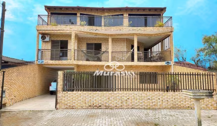Casa com 5 dormitórios à venda, 320 m² por R$ 900.000,00 - Coroados - Guaratuba/PR