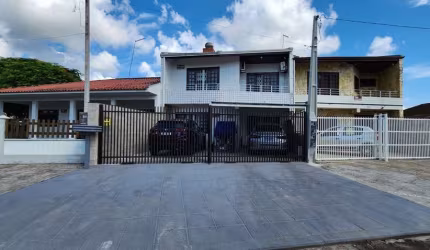 Sobrado com 3 dormitórios à venda, 124 m² por R$ 600.000,00 - Brejatuba - Guaratuba/PR