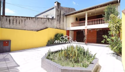 Casa com 4 dormitórios à venda, 184 m² por R$ 790.000,00 - Centro - Guaratuba/PR