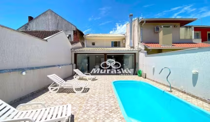 Sobrado com piscina, 3 dormitórios para alugar por R$ 3.691/mês - Eliana - Guaratuba/PR