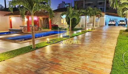 Casa com 02 piscinas + bar molhado construída em terreno de 1000 m² em rua asfaltada no Alto da Boa