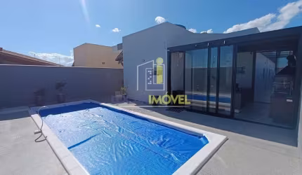 Casa de  4 suítes + dependência , cozinha e quartos planejados, piscina aquecida,  energia solar ár