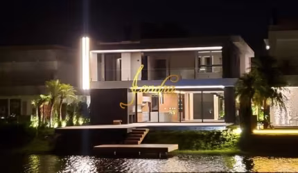 Sobrado contemporâneo no condomínio Sense com 6 suítes semi mobiliado