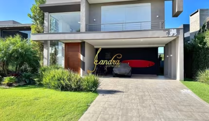 Belíssima Sobrado no Condomínio Enseada! Estilo Contemporâneo, composto por 05 suítes com sacada