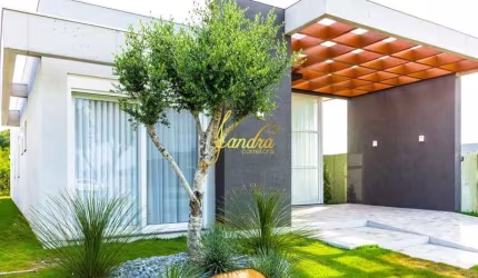 Casa em condomínio fechado com 4 suítes mobiliada/decorada com piscina