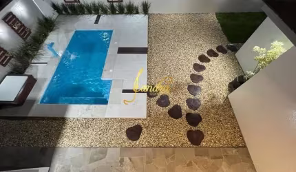 Sobrado duplex com 04 suítes, piscina