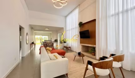 Excelente Casa no Condomínio Riviera Estilo contemporânea! Composta por 4 suítes, sendo 2 americanas,