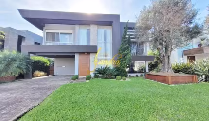 Casa condomínio com 05 suites e piscina aquecida