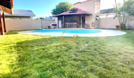 Casa em Atlântida perto mar, com 04 dormitórios e  piscina