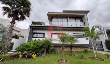 Casa mobiliada em condomínio para venda com 5 suítes e 4 vagas de garagem com 480m² - Urbanova