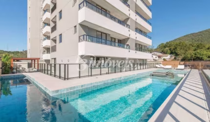 Apartamento semimobiliado à venda, 3 quartos sendo 1 suíte, 2 vagas, Catania Residencial, Bairro Fazenda, Itajaí-SC