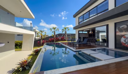 Casa alto padrão com 4 quartos sendo 3 suítes, 5 vagas de garagem, no Jardim Amélia,