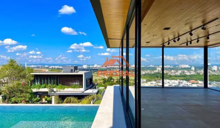 Casa Apuã: Arquitetura contemporânea e assinada, localizada no Condomínio Reserva do Paratehy e projetada para proporcionar uma vista de 360º graus.
