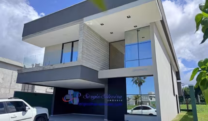 Casa de alto padrão com 5 suítes no Eusébio com lazer completo.