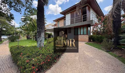 Linda e aconchegante Casa no Condomínio Alphaville Campinas à venda.  Arquitetura de JANNINI SAGARRA ARQUITETURA, Paisagismo do renomado MARCELONOVAES