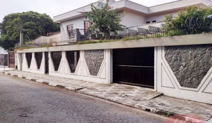 Casa com 5 dormitórios à venda, 438 m² por R$ 1.300.000,00 - Jardim Realce - Suzano/SP