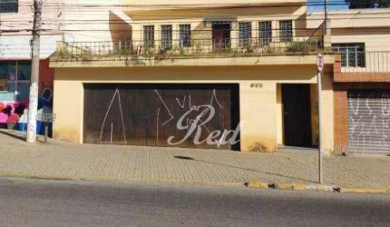 Casa com 4 dormitórios para alugar, 244 m² por R$ 7.185,95 - Centro - Poá/SP