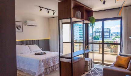 Studio com 1 dormitório para alugar, 48 m² por R$ 4.417,00/mês - Coqueiros - Florianópolis/SC