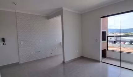 Apartamento com 2 dormitórios  sendo 1 suíte