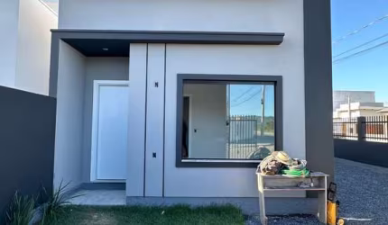 Casa com 2 dormitórios sendo 1 suíte