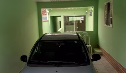 Vendo lote em Araucária com  03 casas construídas.