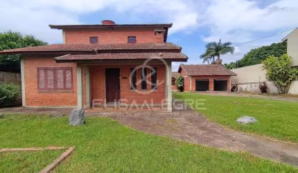 Sobrado + casa auxiliar em terreno de 1.864m² em Esteio