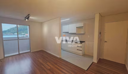 Apartamento com 2 dormitórios para alugar, 53 m² por R$ 2.318,20/mês - Espinheiros - Itajaí/SC