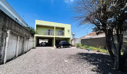 Sobrado 5 dormitórios sendo 1 suíte em Canoas