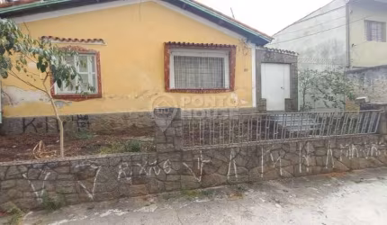 Terreno à venda no bairro Vila Brasilina com uma casa térrea e 3 vagas