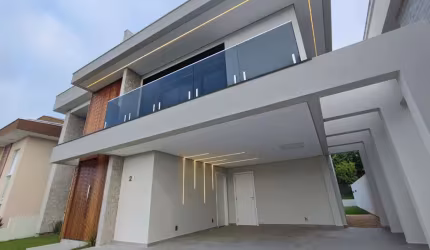 CASA COM 3 SUITES EM CONDOMINIO FECHADA INGLESES - NORTE DA ILHA