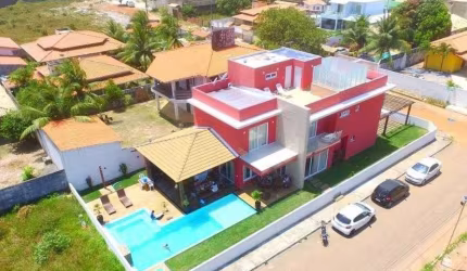 Casa com 4 dormitórios à venda, 500 m² por R$ 1.500.000,00 - Barra do Jacuípe - Camaçari/BA