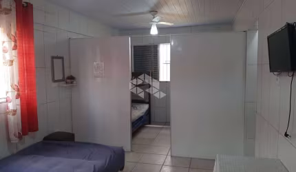 VENDO KITNET MOBILIADA NO TÉRREO, REFORMADA, C/ 01 VAGA E A 50 METROS DA PRAIA. MIRIM, PRAIA GRANDE SP.