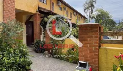 Casa em Condomínio Fechado à Venda em Camburizinho - 2 Dormitórios, Suíte, Garagem e Lazer!