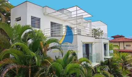 Imperdível! Casa de luxo à venda em Ilhabela-SP, bairro Siriuba: 3 suítes, 2 salas, 5 banheiros, vista para o mar, 409m².