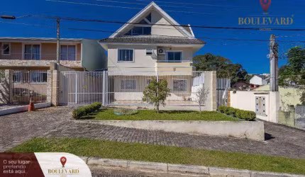 Sobrado semi-mobiliado de rua, com 3 dormitórios à venda, 138 m² por R$ 690.000 - Guabirotuba - Curitiba/PR