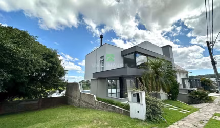 Luxuosa casa em condomínio à venda na Hípica, Porto Alegre-RS: 3 quartos, 3 suítes, 2 salas, 5 banheiros, 6 vagas, 344 m².