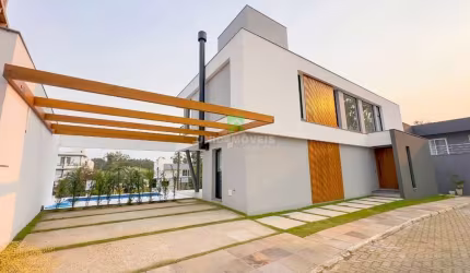 Impecável casa em condomínio à venda na Hípica com 4 quartos, 4 suítes e 234m² em Porto Alegre-RS!