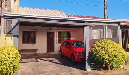 Casa à venda em Porto Alegre-RS, bairro Hípica: 2 quartos, 2 salas, 1 banheiro, 2 vagas, área de 63,84m². Imperdível!