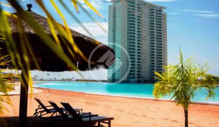 Apartamento condominio Brasil Beach de 88m2 com dois quartos sendo uma suíte, sacada com chiurrasqueira, banheiro social, lavabo, móveis planejados, duas vagas de garagem, depósito, área de lazer comp