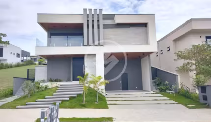 Linda casa com 4 suítes, elevador, cozinha integrada e piscina codigo: 111094