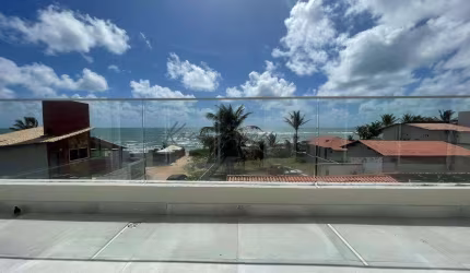 Casas conectadas de frente para o mar na Praia de Tabatinga